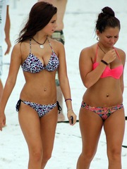 Teen sisters on the beach tanning naked